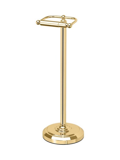 Bailey Freestanding Toilet Paper Holder in Polished Brass.